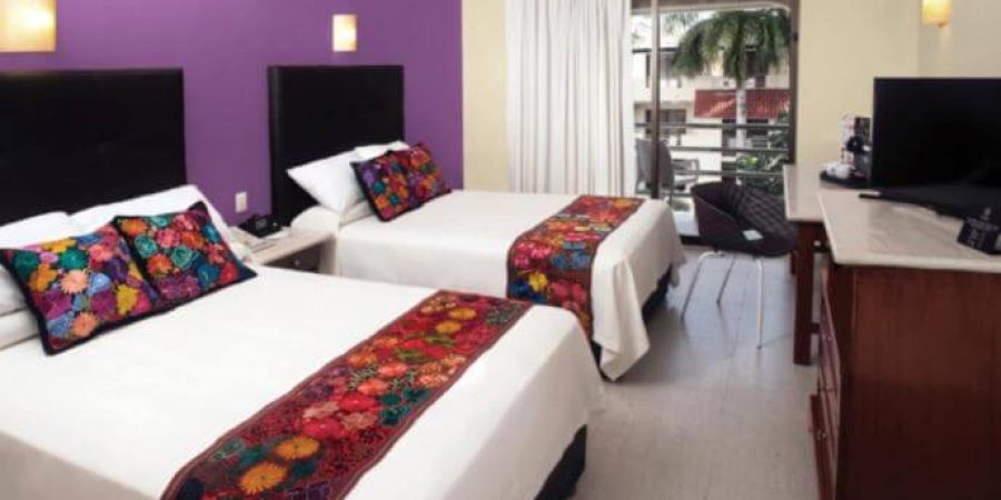 חדר שינה במלון Adhara Hacienda Cancun