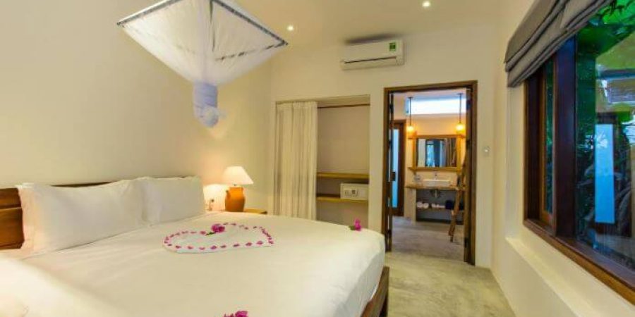 חדר שינה נוסף במלון Vina Beach Pool Villas